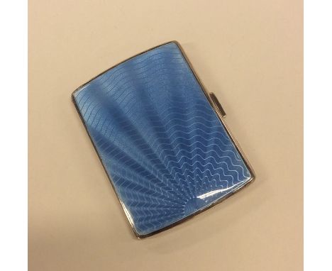 A silver and enamel cigarette case with hinged top. Birmingham. By DF. Approx. 91 grams. Est. £30 - £50.