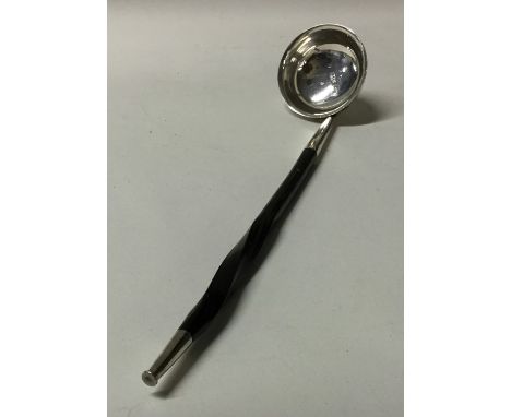 A Victorian silver toddy ladle with whalebone handle. Approx. 28 grams. Est. £20 - £30.