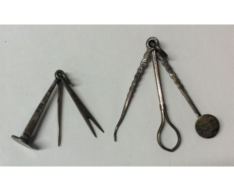 Two silver pipe cleaning sets. Approx. 12 grams. Est. £30 - £50.