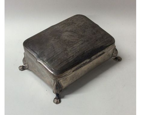 A silver sloping top jewellery box with engine turned lid and fitted interior. Birmingham. Approx. 175 grams. Est. £70 - £80.