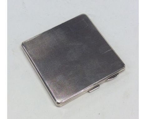 An engine turned square cigarette case with vacant cartouche. Birmingham. Approx. 120 grams. Est. £30 - £40.