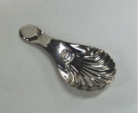 A stylish silver fluted caddy spoon. Chester. By ME. Est. £20 - £30.