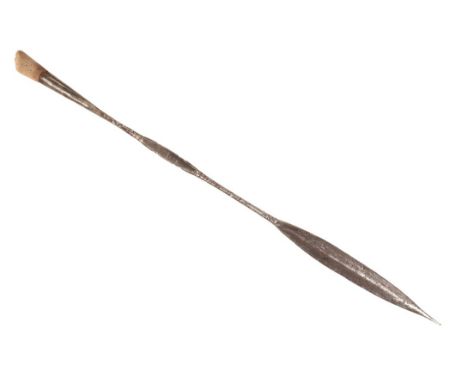 AN AFRICAN METAL SPEAR HEAD with a double-edged blade, 83cm longNote: You must be over 18 to purchase this item. By bidding o