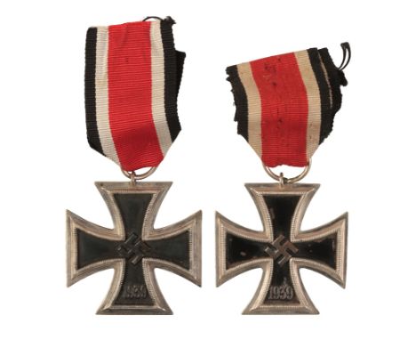 TWO 1939 IRON CROSSES 2ND CLASSan unmarked example with paint loss to the obverse and reverse and replacement ring; the other