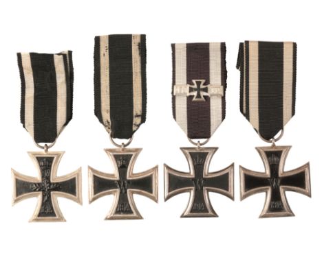 FOUR 1914 IRON CROSS 2ND CLASSall with three-piece construction, the first ring stamped with maker mark 'WD', 16.7g; the seco