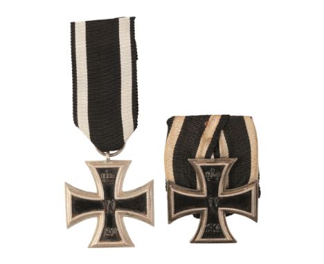 TWO 1914 IRON CROSSES 2ND CLASSone with three-piece construction, contemporarily court mounted as worn, slight bubbling on th