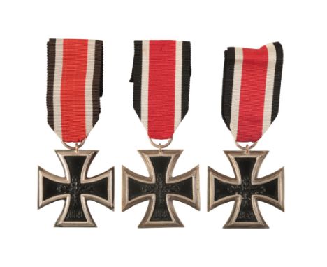THREE 1957 IRON CROSSES 2ND CLASSthe first two are not maker-marked; the third maker marked 'F' to the ring; together with a 