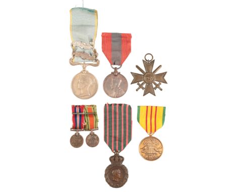 A GROUPING OF WORLD MEDALSincluding a Crimea Medal, Balaklava and a copy Sebastopol bar, the medal is skimmed and in fine con