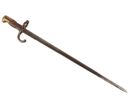 A CHASSEPOT BAYONET with a wood and brass-tipped handle, the double-edged blade 62cm longNote: You must be over 18 to purchas