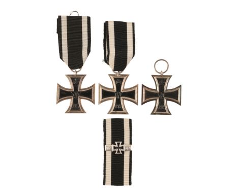 THREE 1914 IRON CROSSES 2ND CLASSall with three-piece construction, the first with no maker's mark, repaired via the frame be