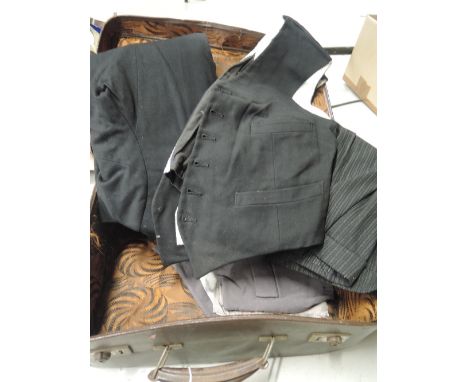 A selection of mens vintage clothing ranging from 1940'2 to 50's in vintage suitcase