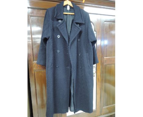 A vintage 1970s ladies black wool coat by St Michaels approx size 10 and a 1980's beige wool coat, approx size 14