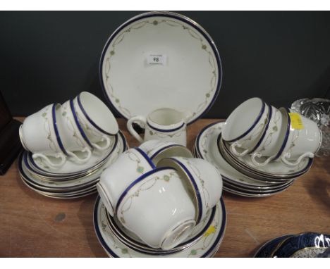 A vintage part tea service by Heathcotes and sons China in the Sweraton patern