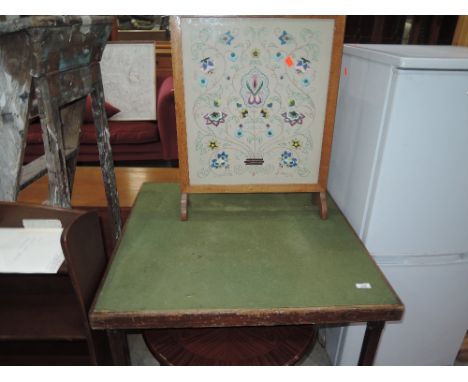 A tapestry firescreen and vintage folding card table