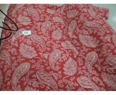 A beautiful vintage double red cotton bed spread having paisley detailing, around 1940s,some holes and damage and a few age r