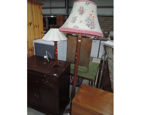 An early 20th Century mahogany Arts and Crafts style standard lamp and similar table lamp