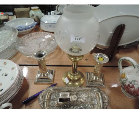 A selection of vintage column style candle sticks