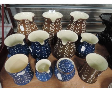 A selection of vintage local pottery Schofield WetheriggsCONDITION REPORT - Chips on rim of two large brown jugs, one medium 