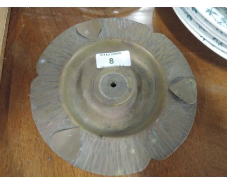 A vintage piece of trench art a trinket cigarette dish bearing marks to base 1917 and military foot 