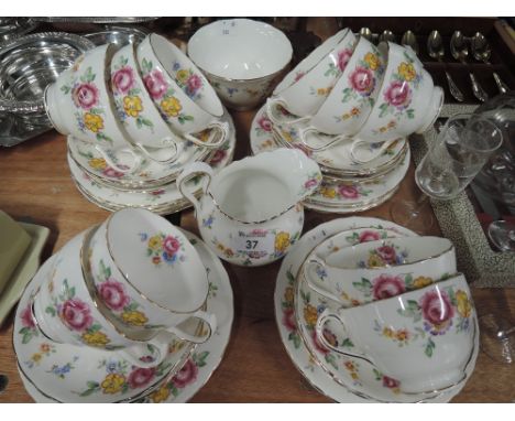A vintage part tea service by New Chelsea