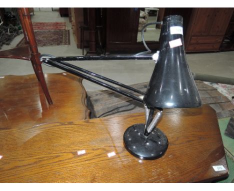 A vintage angle poise lamp