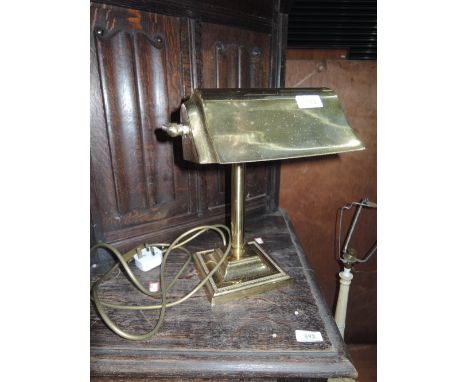 A brass desk lamp
