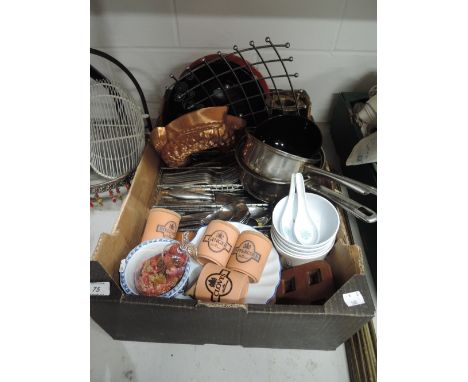 A selection of vintage kitchen wares including cutlery