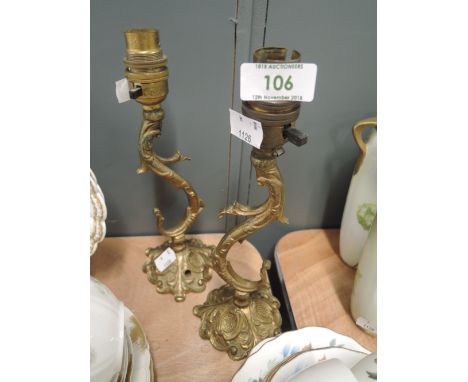 A pair of vintage stylised brass cast lamp base