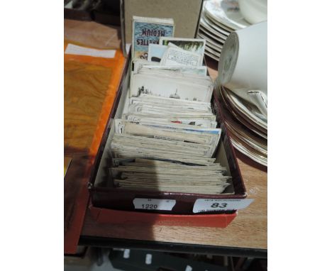 A selection of vintage cigarette and similar collectable cards