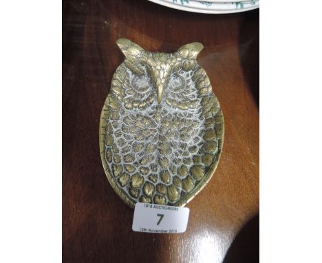 A vintage brass cast trinket dish in the design of an owl
