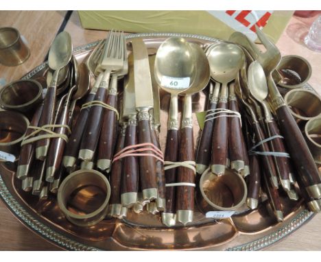 A selection of vintage brass and mahogany handle cutlery and flatwares