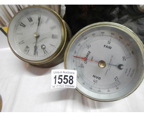 A brass cased ship's clock and barometer by Simpson Lawrence Glasgow
