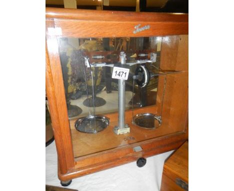 A cased set of balance beam apothecary scales