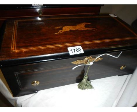 A good Victorian music box playing 6 tunes, in very good condition and case in good order
All teeths and tips present
In work