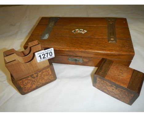 An inlaid playing card box and one other