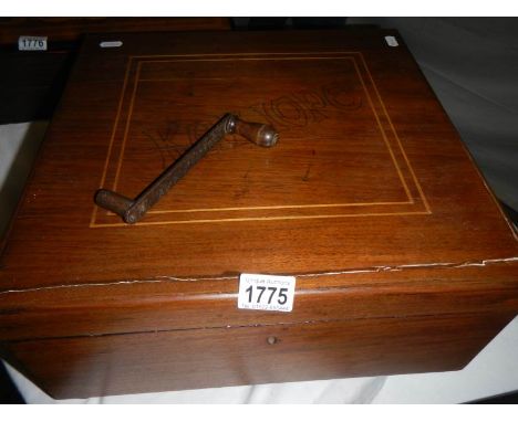 A good table disc music box playing 13" discs, only 1 disc with it, plays well
It has kalliope carved into the top of the lid