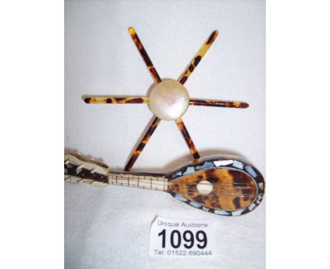A miniature tortoise shell mandolin and one other item
