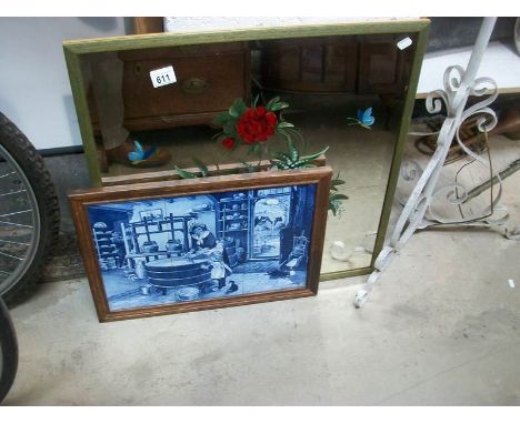 An unusual framed kitchen tile picture and a decorated mirror