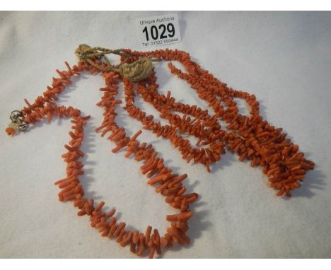 2 antique 'stick' coral necklaces (3 stand and single strand with silver clasp)