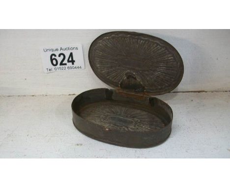 A tin snuff box 'Pat. Jan 1st 1869?', G Parker