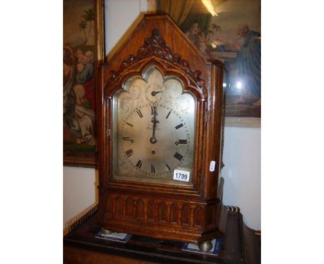 A 19th century oak bracket clock, strikes on bells