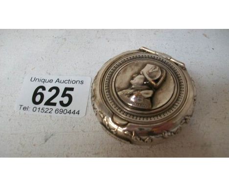 A silver plated snuff box with profile portrait of Napoleon Bonaparte on lid