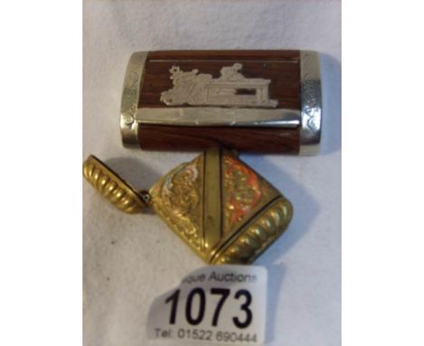 An ornate snuff box and vesta