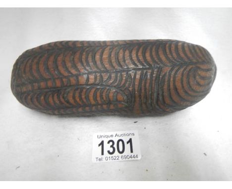 A carved Polynesian/aboriginal? wooden item