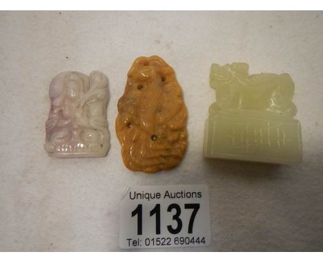 2 jade medallions and a jade dog of foo