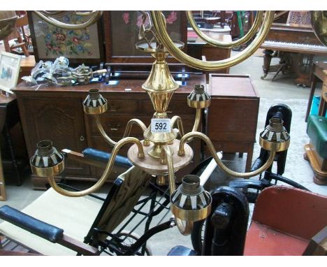 A 5 lamp brass ceiling light