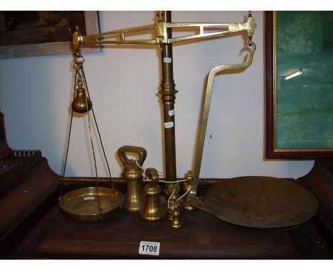 A set of 'Banfield' brass balance scales and weights