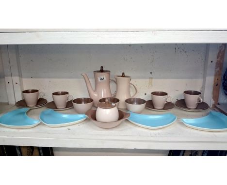 A Poole pottery coffee set and 4 dishes