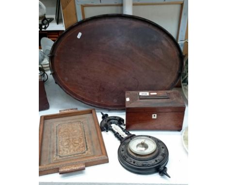 A rosewood tea caddy, an ebonised barometer, 2 inlaid trays and a pair of Delft hand painted plates