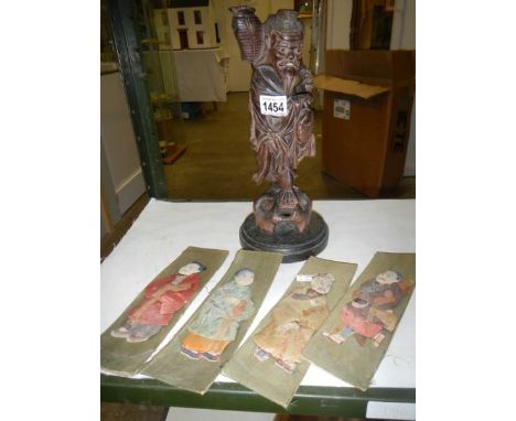 A good quality carved wood Chinese lamp and 4 Chinese fabric panels